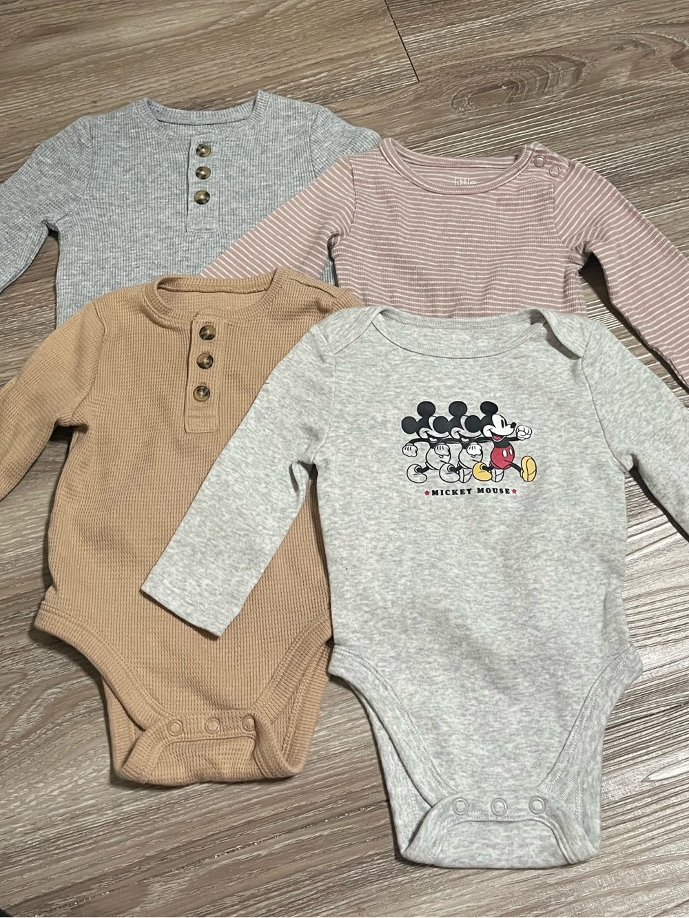 4 Pack of 6 & 9 Month Long Sleeve Onesies